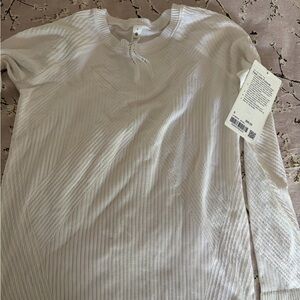 Brand new with tags Lululemon White Long-Sleeve restless pullover size 8